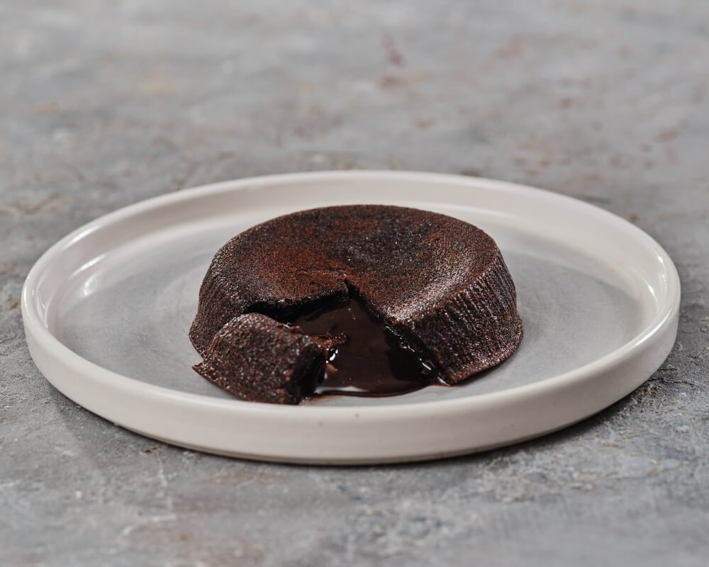 Bitter çikolata ile hazırlanmış harika dokusu ve akışkan kremasıyla çok sevilen efsane lezzet..